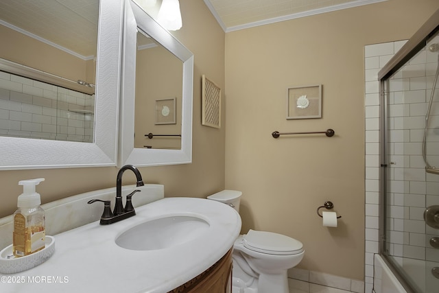 full bathroom with toilet, tile patterned floors, combined bath / shower with glass door, crown molding, and vanity