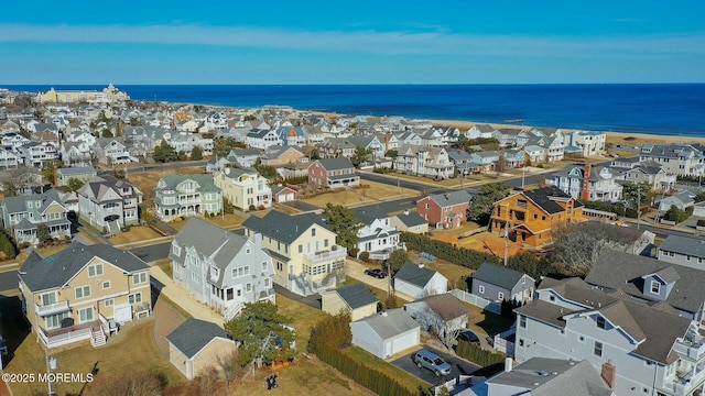 aerial view featuring a residential view and a water view