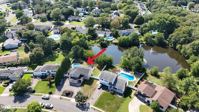 aerial view with a water view and a residential view