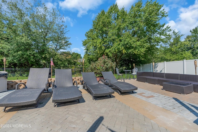 view of patio / terrace featuring a fenced backyard and outdoor lounge area