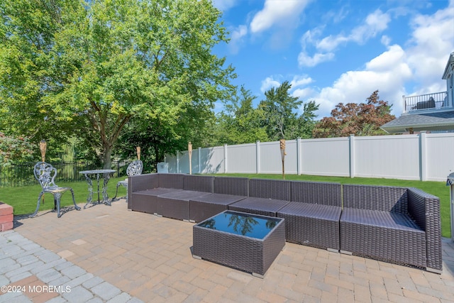 view of patio / terrace featuring a fenced backyard and an outdoor hangout area