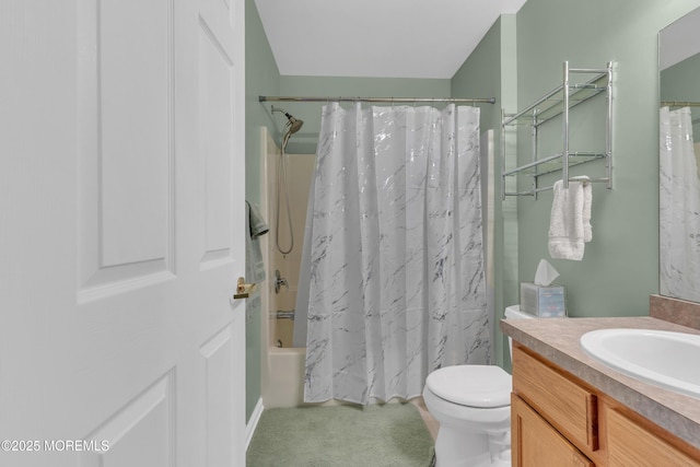 full bath featuring toilet, shower / tub combo with curtain, and vanity