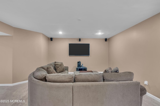 living area with light carpet, recessed lighting, and baseboards