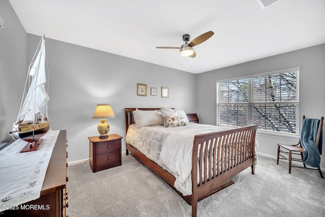 bedroom with carpet floors, ceiling fan, and baseboards