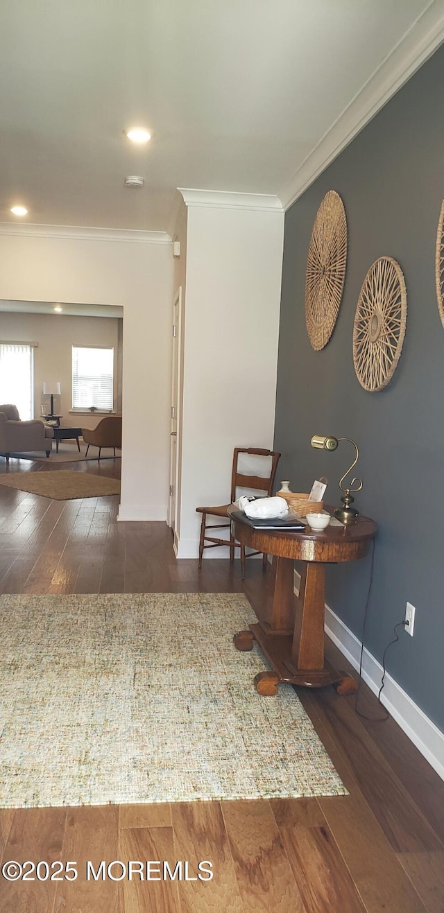 office area featuring ornamental molding, wood finished floors, and baseboards