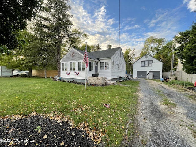 123 Harbor Inn Rd, Bayville, NJ 08721 - bungalow-style home with an outdoor structure and a detached garage