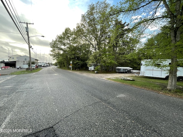 123 Harbor Inn Rd, Bayville, NJ 08721 - view of asphalt street featuring street lighting
