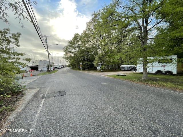 123 Harbor Inn Rd, Bayville, NJ 08721 - view of asphalt road with street lights