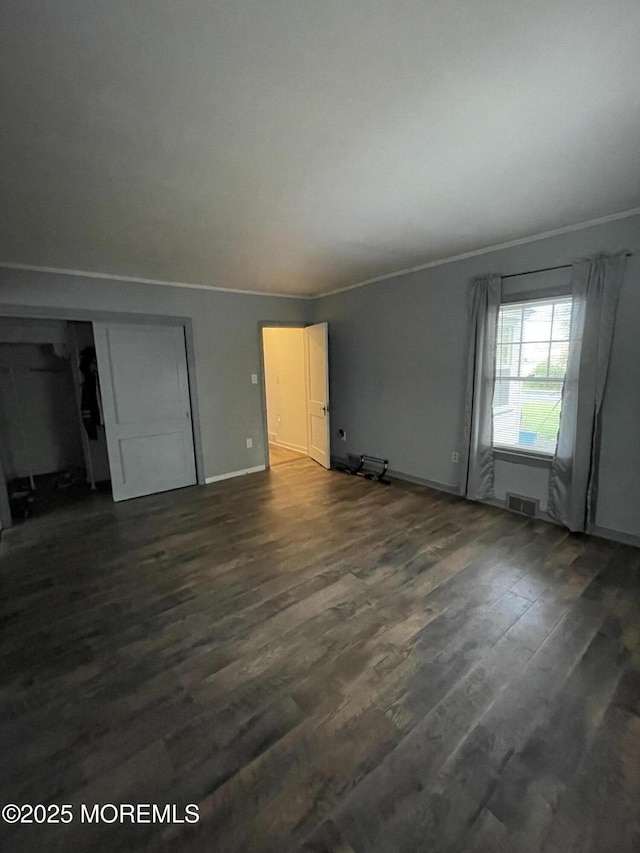 123 Harbor Inn Rd, Bayville, NJ 08721 - unfurnished living room featuring crown molding, dark wood finished floors, and baseboards