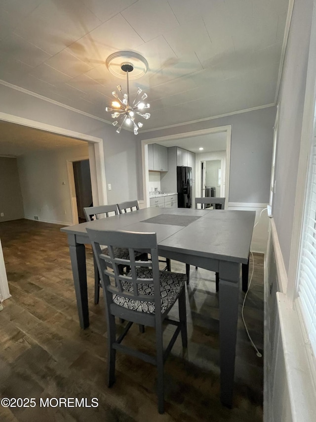 123 Harbor Inn Rd, Bayville, NJ 08721 - dining space featuring crown molding, a chandelier, and dark wood-style floors