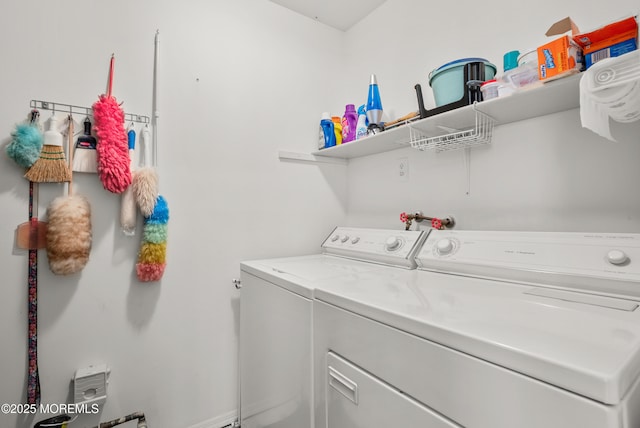 laundry room with washing machine and dryer and laundry area