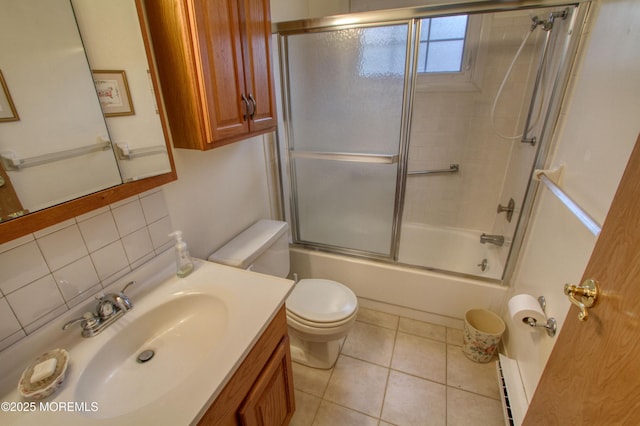 bathroom featuring a baseboard radiator, tile patterned flooring, toilet, vanity, and backsplash