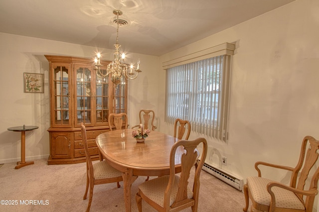 dining area with a notable chandelier, baseboard heating, baseboards, and light colored carpet