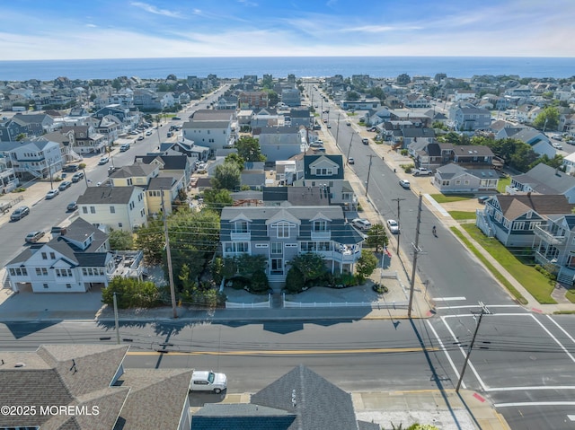 aerial view featuring a residential view and a water view