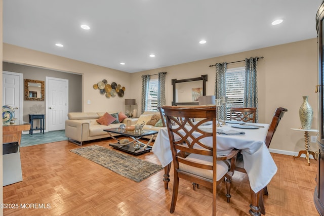 dining room featuring a wealth of natural light, baseboards, and recessed lighting