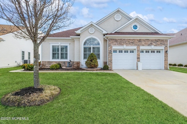 view of front of home with driveway, stone siding, an attached garage, a front lawn, and stucco siding