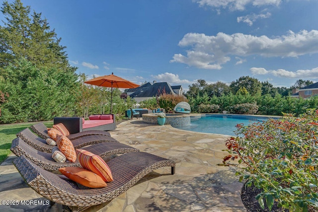 pool with a patio area