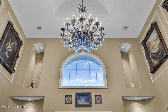 bathroom featuring visible vents, a notable chandelier, and crown molding