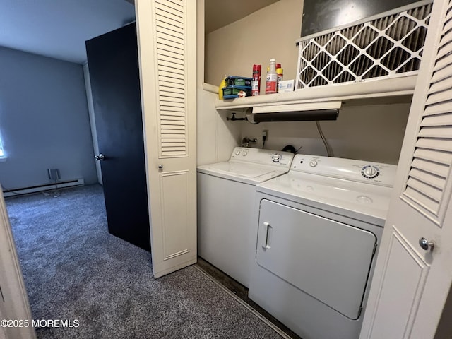 laundry area featuring washer and dryer, laundry area, dark carpet, and baseboard heating