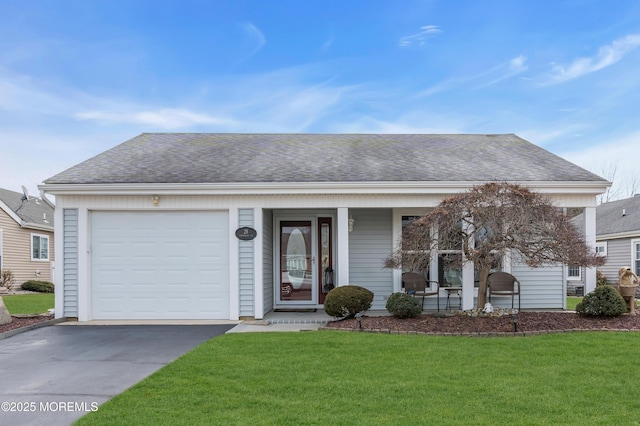 ranch-style house featuring roof with shingles, covered porch, an attached garage, a front yard, and driveway