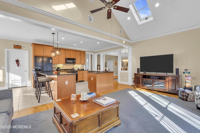 living room with high vaulted ceiling, recessed lighting, a ceiling fan, visible vents, and crown molding