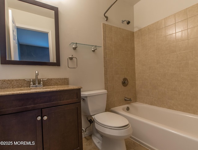 full bathroom with washtub / shower combination, vanity, and toilet