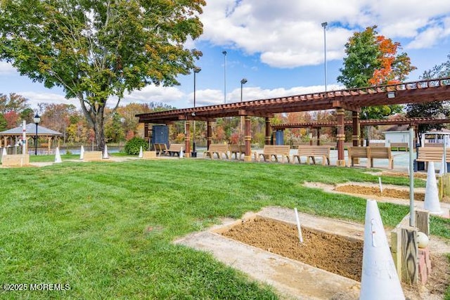 surrounding community featuring a lawn