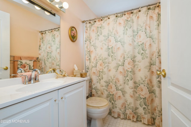 full bath featuring a shower with shower curtain, toilet, vanity, and tile patterned flooring