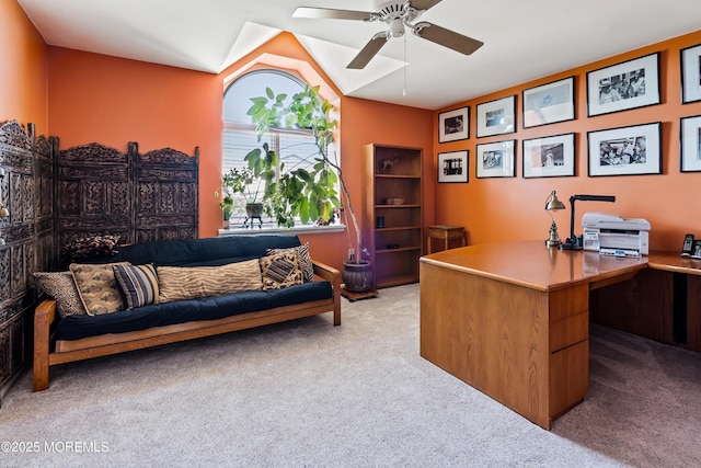 home office featuring carpet floors and a ceiling fan