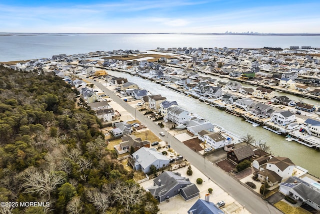 aerial view featuring a residential view and a water view