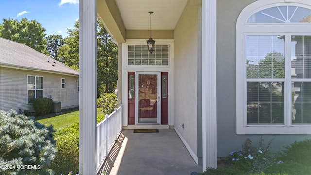 doorway to property with stucco siding