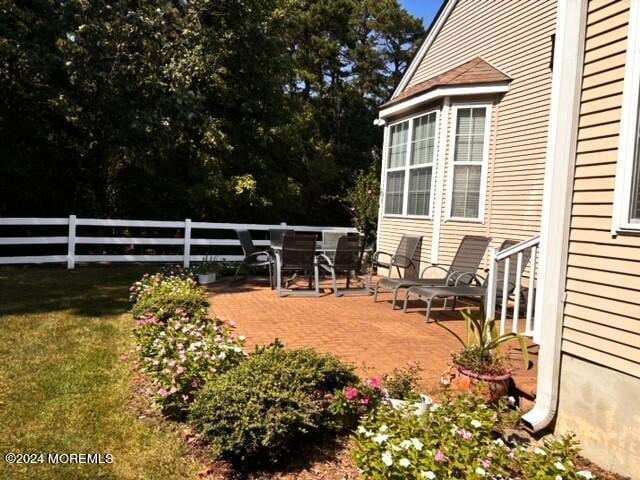 view of patio / terrace with fence