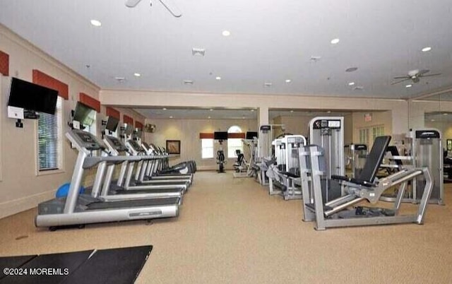 exercise room with carpet, baseboards, crown molding, and recessed lighting