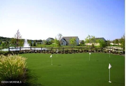 view of property's community featuring a water view