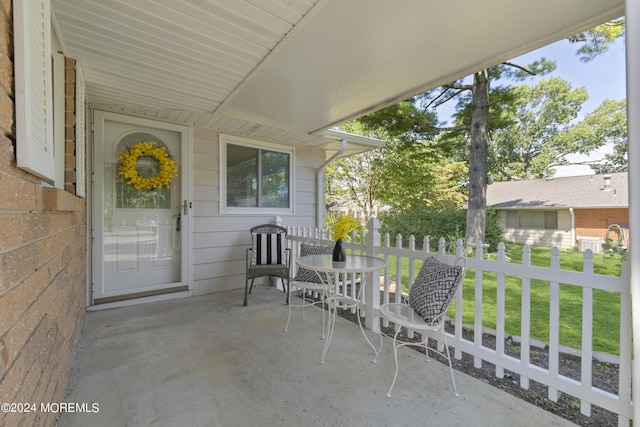 view of patio with fence