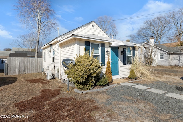 view of front of home with fence