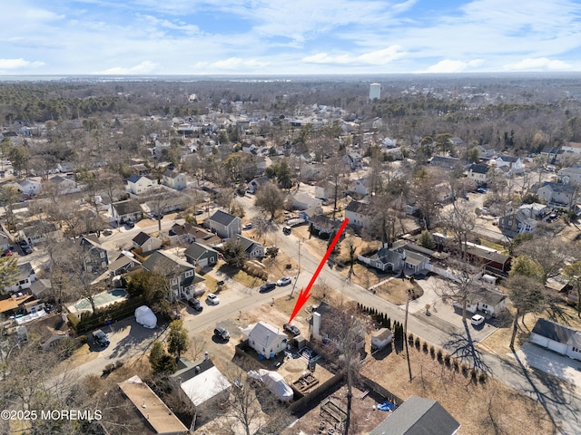 birds eye view of property with a residential view