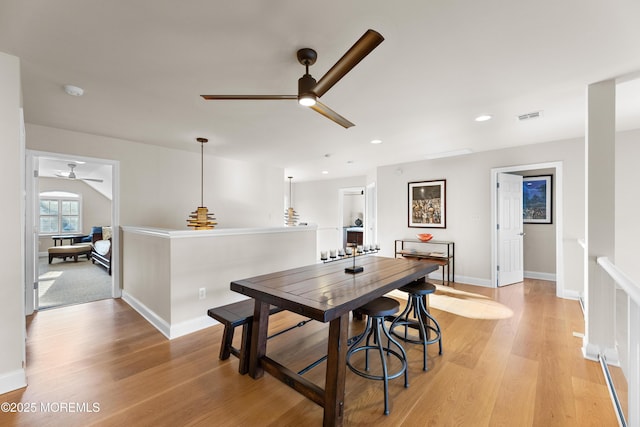 dining area featuring ceiling fan, recessed lighting, visible vents, and light wood-style floors