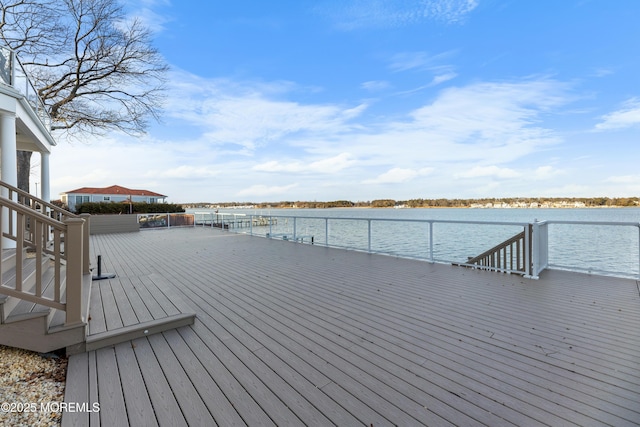 wooden terrace with a water view