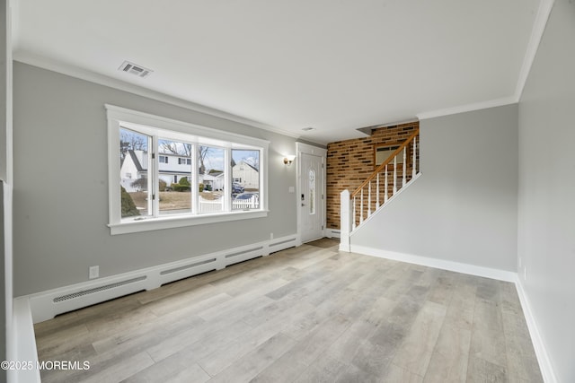 entryway featuring a baseboard radiator, stairway, ornamental molding, wood finished floors, and baseboards