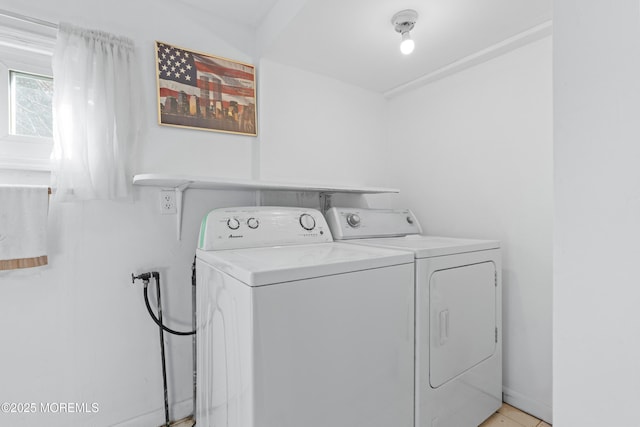 laundry area with laundry area and independent washer and dryer