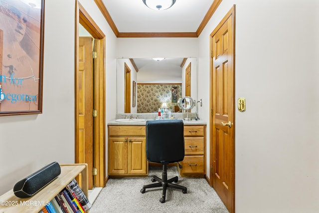 office featuring light carpet, a sink, and crown molding