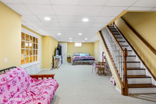 bedroom with baseboards, a drop ceiling, carpet flooring, and recessed lighting