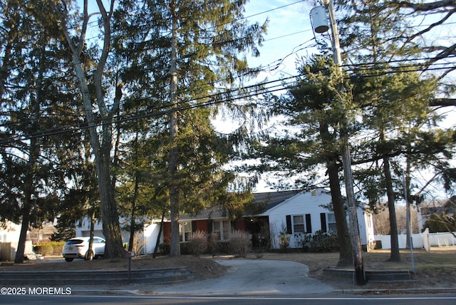 view of front of house with fence