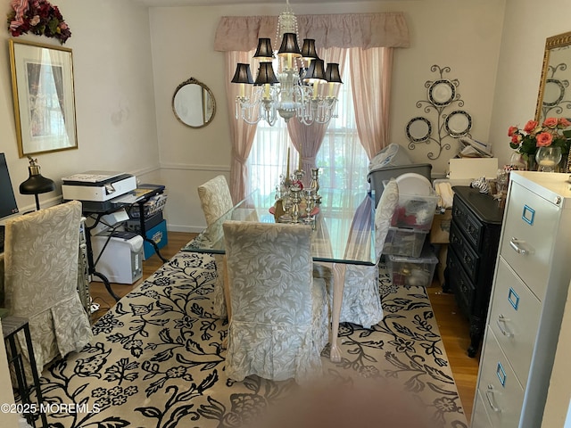 550 Wall St, Eatontown, NJ 07724 - dining area featuring healthy amount of natural light, wood finished floors, and a chandelier