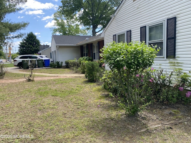 550 Wall St, Eatontown, NJ 07724 - view of property exterior with a lawn