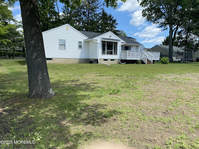 550 Wall St, Eatontown, NJ 07724 - manufactured / mobile home featuring a wooden deck and a front yard