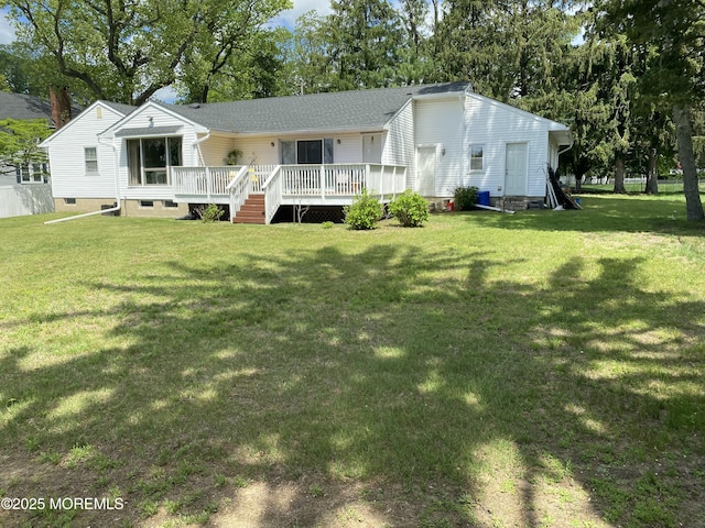 550 Wall St, Eatontown, NJ 07724 - view of front facade featuring a wooden deck, a front lawn, and a shingled roof