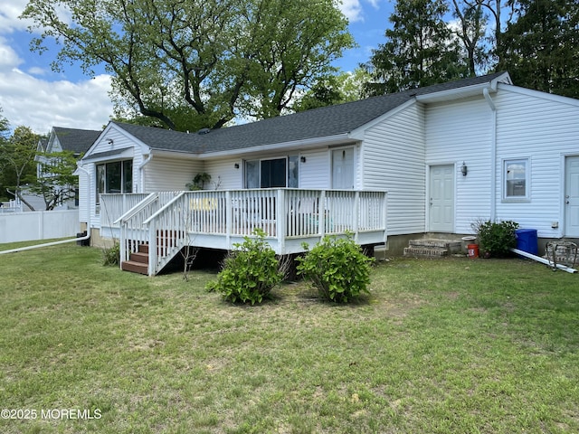 550 Wall St, Eatontown, NJ 07724 - back of property featuring a wooden deck and a shingled roof
