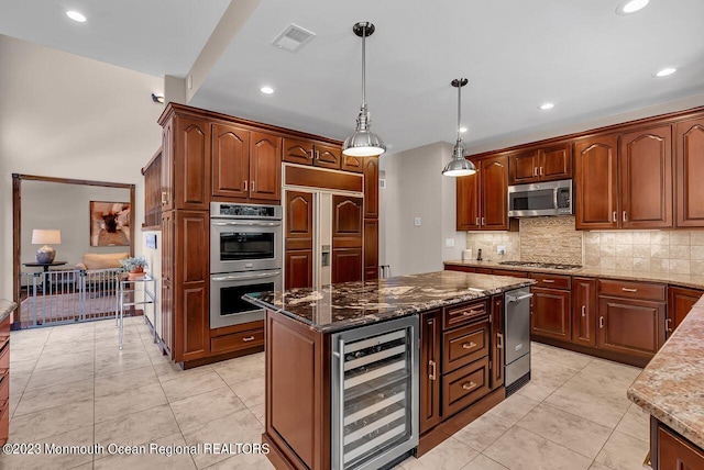 kitchen featuring wine cooler, stainless steel appliances, tasteful backsplash, visible vents, and dark stone counters